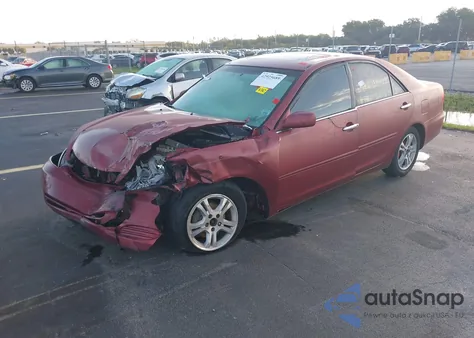2002 Toyota Camry Le z USA, uszkodzony, nr VIN 4T1BE32K22U054336
